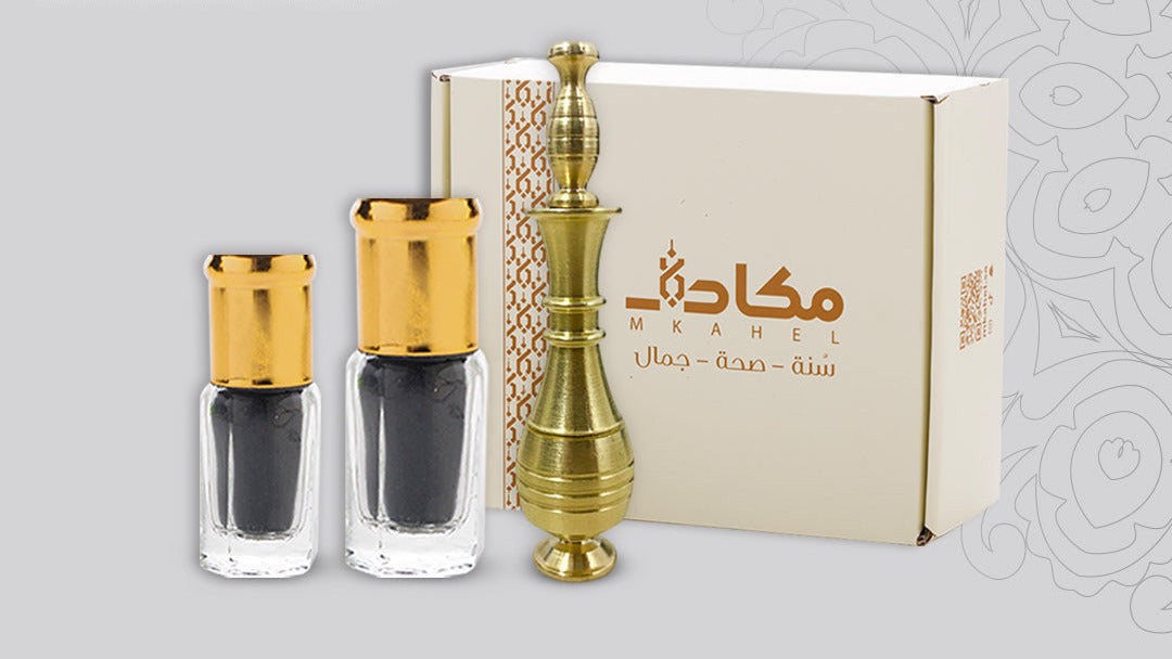 Eyelash package with Tola Black Ithmed Kohl, a copper kohl holder, and a branded box on a light gray background.